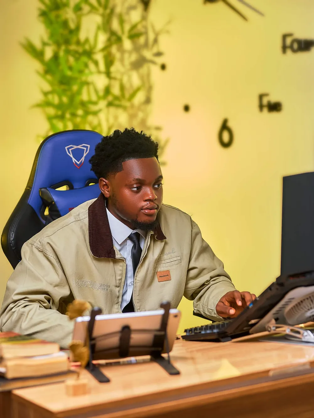 Afeez Tajudeen working at his design desk